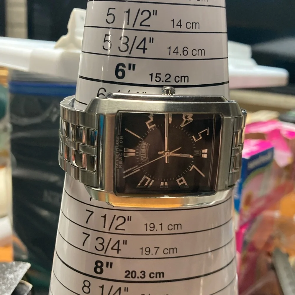 Kenneth Cole Reaction tank watch, stainless, black dial, new battery
